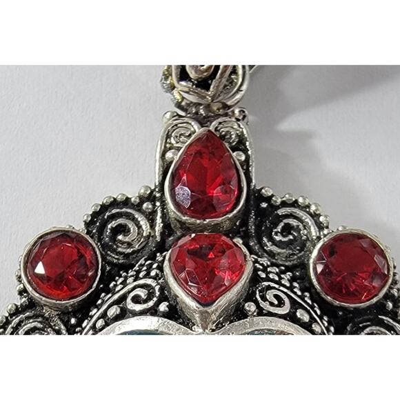 Unique Sterling Silver Pendant with Blue Carved Face and Red Gemstones - Picture 4 of 8